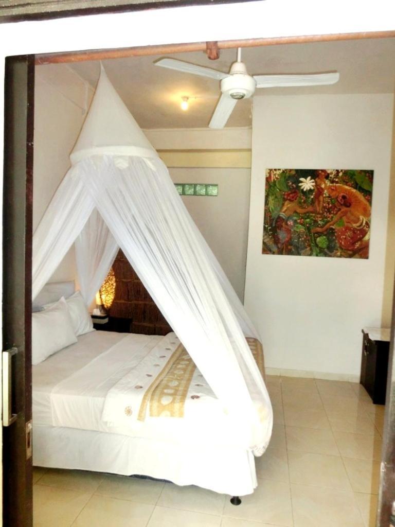 Latugu Homestay Ubud Værelse billede