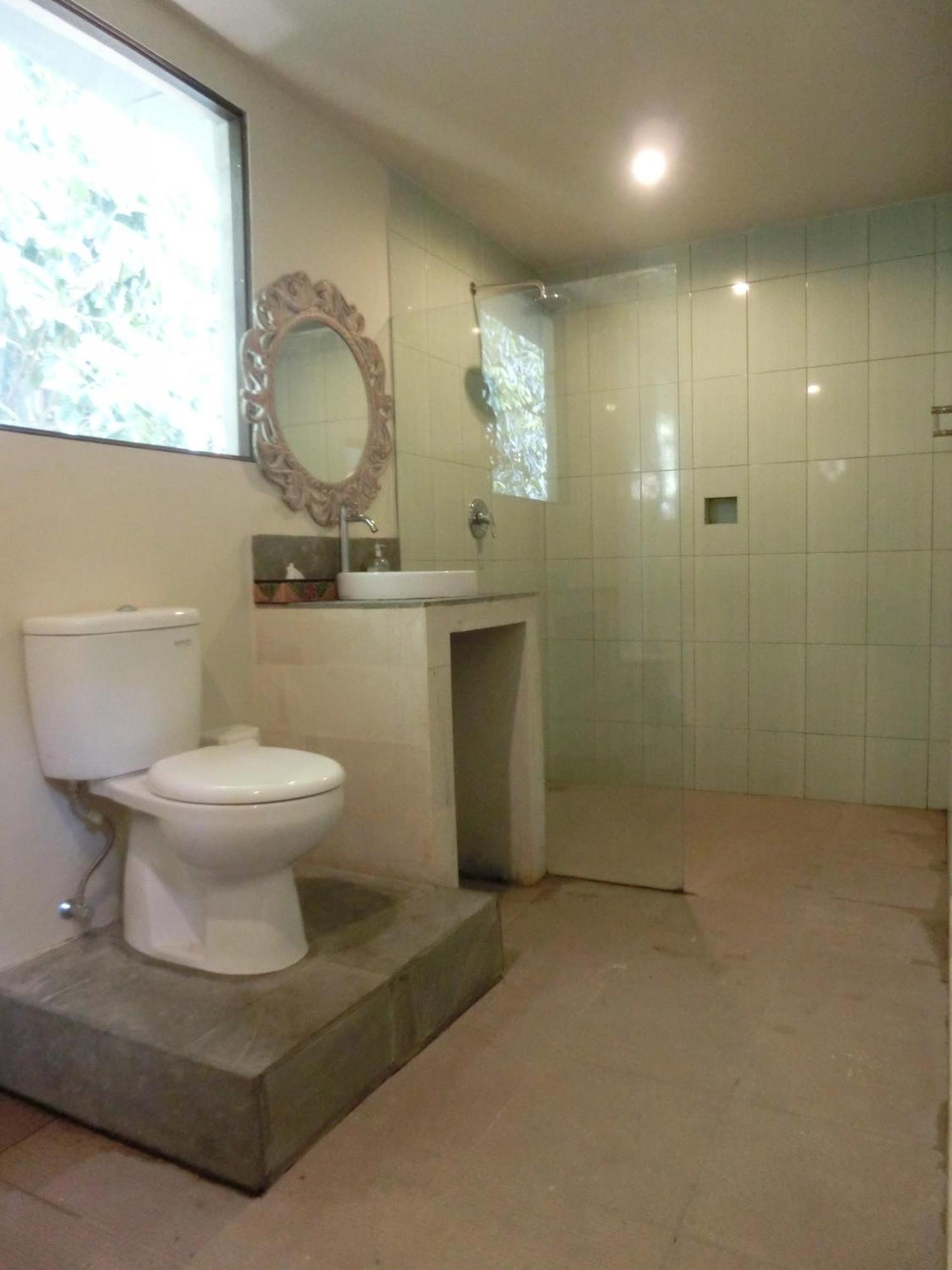Latugu Homestay Ubud Værelse billede
